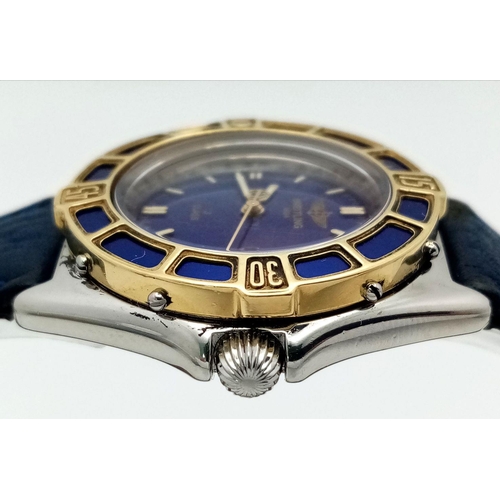 1234 - A Breitling J Class Quartz Ladies Watch. Blue leather strap. Case - 30mm. Blue dial with date window... 