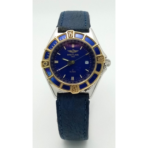 1234 - A Breitling J Class Quartz Ladies Watch. Blue leather strap. Case - 30mm. Blue dial with date window... 