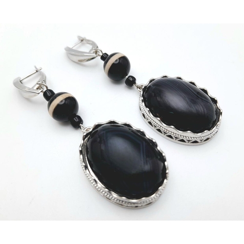 1417 - A Pair of 925 Silver with Black Agate set Drop Earrings. 7cm drop , 21.7g total weight.