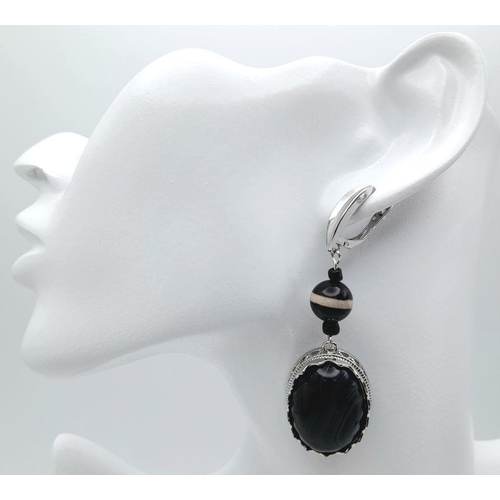 1417 - A Pair of 925 Silver with Black Agate set Drop Earrings. 7cm drop , 21.7g total weight.