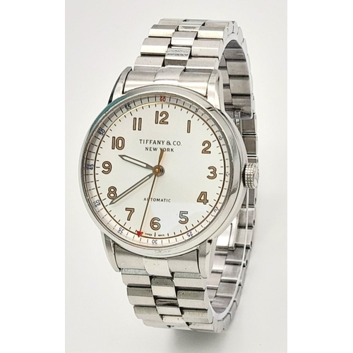 631 - A Tiffany and Co. Automatic Ladies Watch. Stainless steel bracelet and case - 34mm. White dial. Skel... 