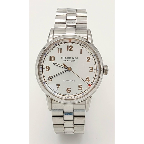 631 - A Tiffany and Co. Automatic Ladies Watch. Stainless steel bracelet and case - 34mm. White dial. Skel... 