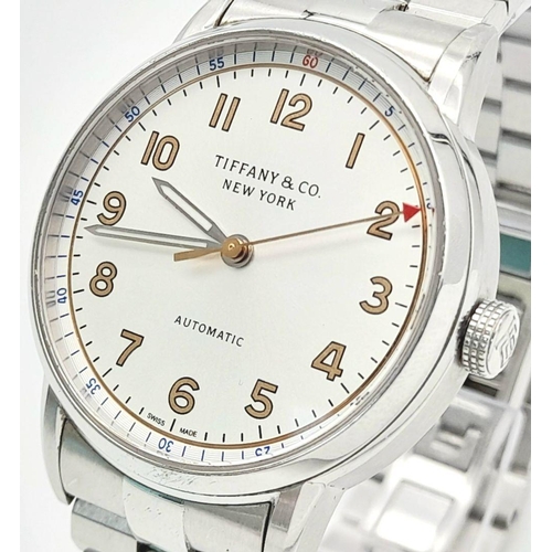 631 - A Tiffany and Co. Automatic Ladies Watch. Stainless steel bracelet and case - 34mm. White dial. Skel... 