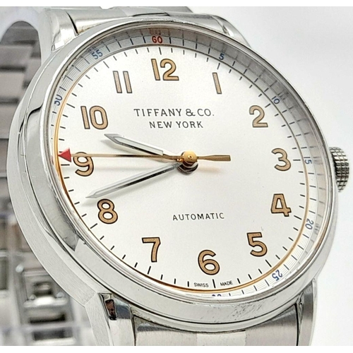 631 - A Tiffany and Co. Automatic Ladies Watch. Stainless steel bracelet and case - 34mm. White dial. Skel... 