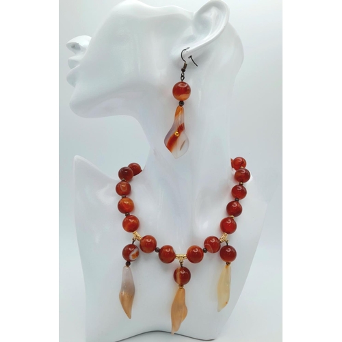 1374 - A vintage carnelian necklace and earrings set with carved Arum lilies pendants (often cale Cala lili... 