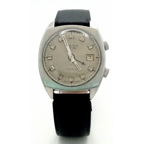 1289 - A Rare Vintage Rodania Datafonic 17 Jewels Gents Alarm Watch. Black leather strap. Stainless steel c... 