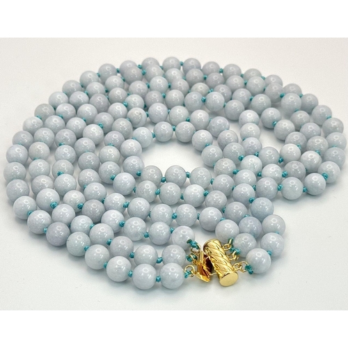 1558 - A Three Row Turquoise Beaded Necklace. 8mm beads. Gilded clasp.  40-46cm length.