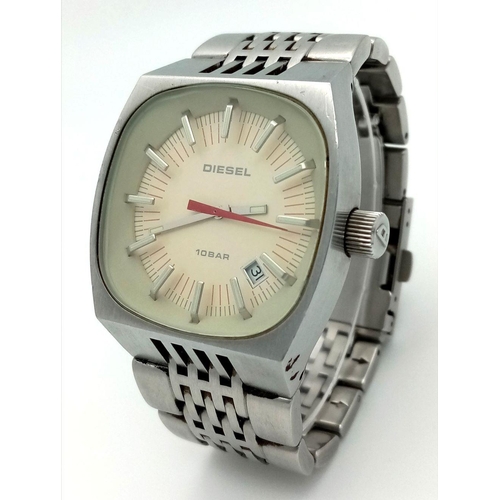 1382 - A Vintage Diesel Quartz Gents Watch. Stainless steel bracelet and case - 38mm. Cream dial. In workin... 