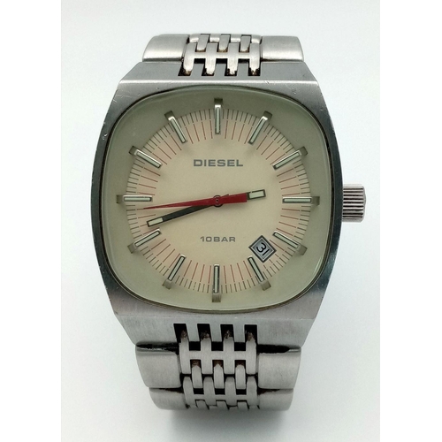 1382 - A Vintage Diesel Quartz Gents Watch. Stainless steel bracelet and case - 38mm. Cream dial. In workin... 