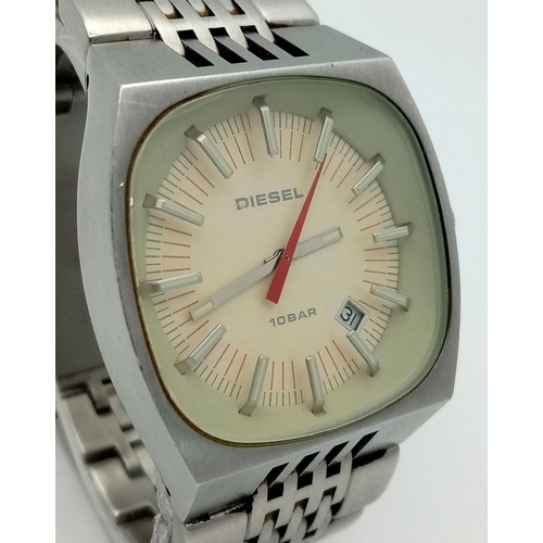 1382 - A Vintage Diesel Quartz Gents Watch. Stainless steel bracelet and case - 38mm. Cream dial. In workin... 