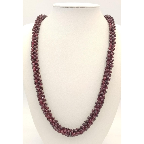 146 - A Deep Red Garnet Cluster Necklace. 48cm length.