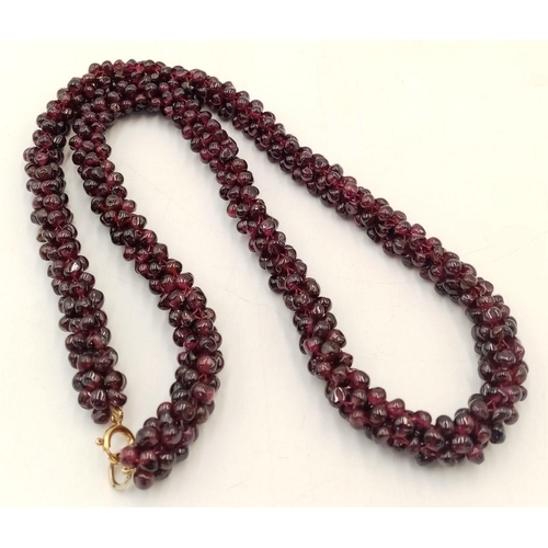 146 - A Deep Red Garnet Cluster Necklace. 48cm length.