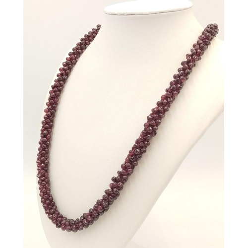 146 - A Deep Red Garnet Cluster Necklace. 48cm length.