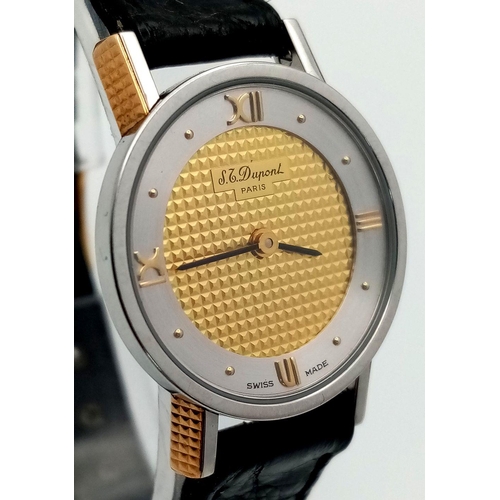 374 - An Elegant Ladies Two Tone Quartz Watch by S.T. Dupont, Paris. Model 199.2.1. This watch has just be... 