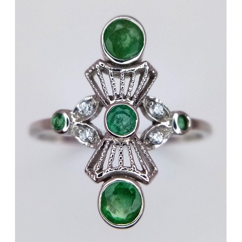 444 - A Stylish Art Deco Design 9 Carat White Gold Emerald and Clear Stone Set Ring Size Q. The Ring Measu... 