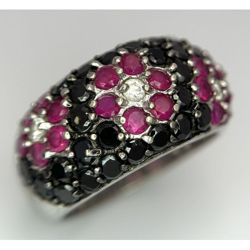 479 - An Attractive Sterling Silver Ruby, Onyx and CZ Set Cluster Ring Size O. The Crown Measures 1.1cm Wi... 