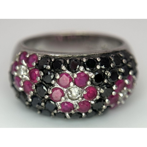 479 - An Attractive Sterling Silver Ruby, Onyx and CZ Set Cluster Ring Size O. The Crown Measures 1.1cm Wi... 