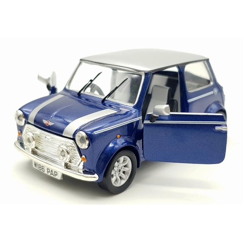 646 - A Corgi Mini Cooper - End of an Era Model. Three Piece boxset on plinth. Comes with a certificate. A... 