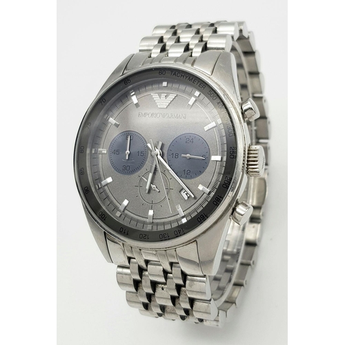 780 - An Emporio Armani Quartz Gents Watch. Stainless steel bracelet and case - 42mm. Grey dial with three... 