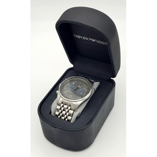 780 - An Emporio Armani Quartz Gents Watch. Stainless steel bracelet and case - 42mm. Grey dial with three... 