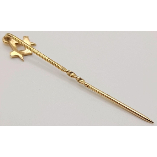 1004 - A 9K Yellow Gold Masonic Symbol Stick Pin. 4cm. 0.5g