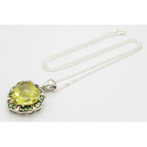 1013 - A Sterling Silver Citrine and Peridot Set Pendant Necklace. 46cm Length. Pendant Measures 2cm Wide. ... 