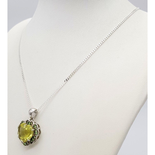 1013 - A Sterling Silver Citrine and Peridot Set Pendant Necklace. 46cm Length. Pendant Measures 2cm Wide. ... 