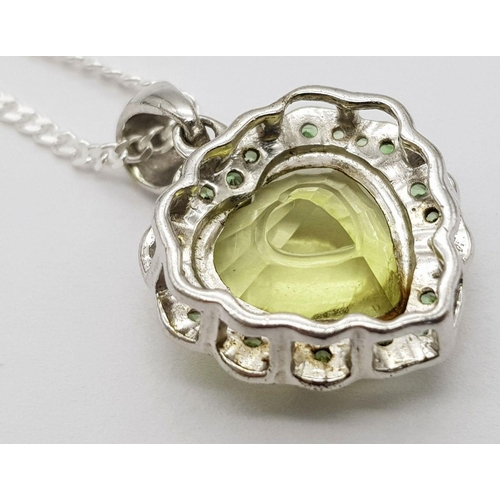 1013 - A Sterling Silver Citrine and Peridot Set Pendant Necklace. 46cm Length. Pendant Measures 2cm Wide. ... 