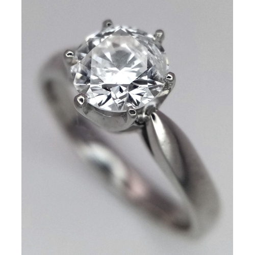 198 - An 18K White Gold Diamond Solitaire Ring. A 1.1ct brilliant round cut diamond. Size O. 4.6g total we... 