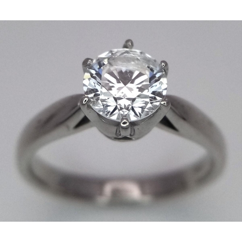 198 - An 18K White Gold Diamond Solitaire Ring. A 1.1ct brilliant round cut diamond. Size O. 4.6g total we... 