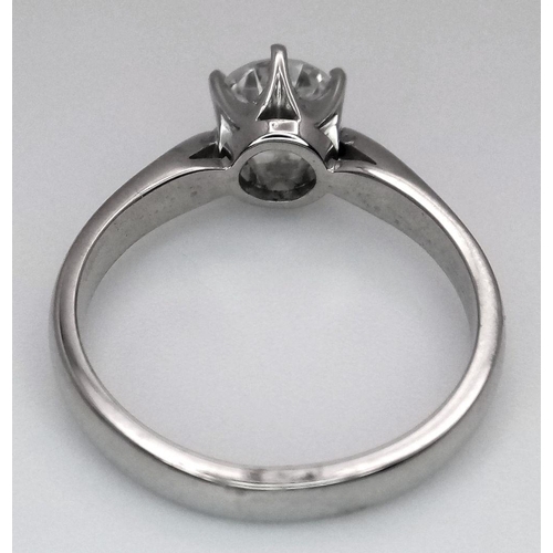 198 - An 18K White Gold Diamond Solitaire Ring. A 1.1ct brilliant round cut diamond. Size O. 4.6g total we... 