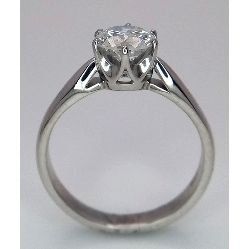 198 - An 18K White Gold Diamond Solitaire Ring. A 1.1ct brilliant round cut diamond. Size O. 4.6g total we... 