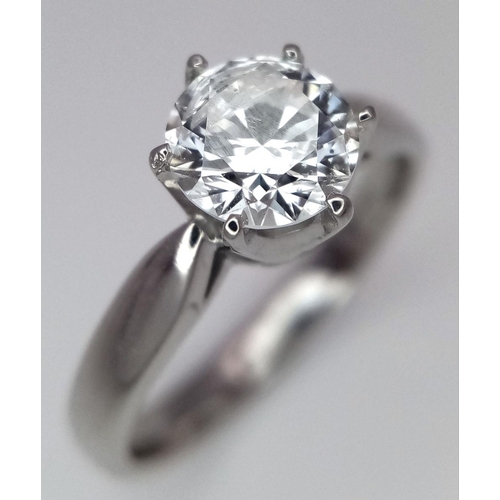 198 - An 18K White Gold Diamond Solitaire Ring. A 1.1ct brilliant round cut diamond. Size O. 4.6g total we... 