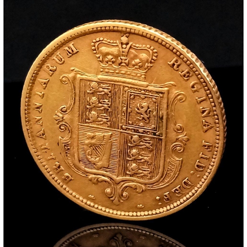 24 - An 1883 Queen Victoria Shield Back 22K Gold Half Sovereign.