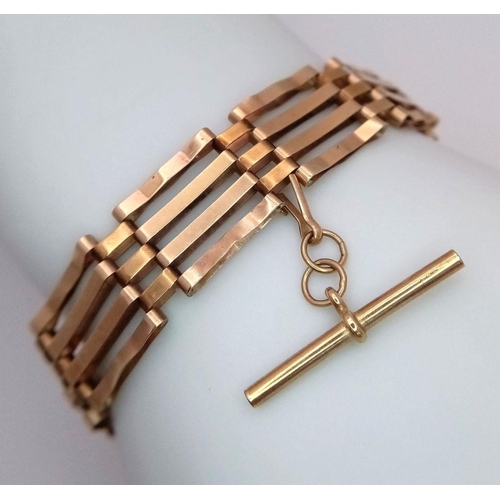 3 - A Vintage 9K Yellow Gold Gate Bracelet with Heart Clasp. T-bar charm. 18cm. 10.68g weight.