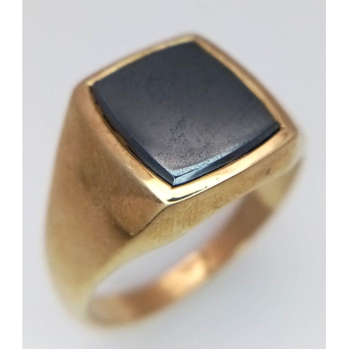 320 - A 9K yellow gold gents signet ring set with hematite, size U 1/2 (stone dimensions:10mmX11mm) 5.7g. ... 