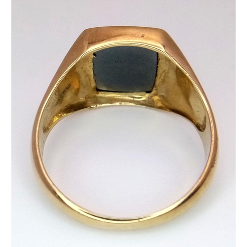 320 - A 9K yellow gold gents signet ring set with hematite, size U 1/2 (stone dimensions:10mmX11mm) 5.7g. ... 