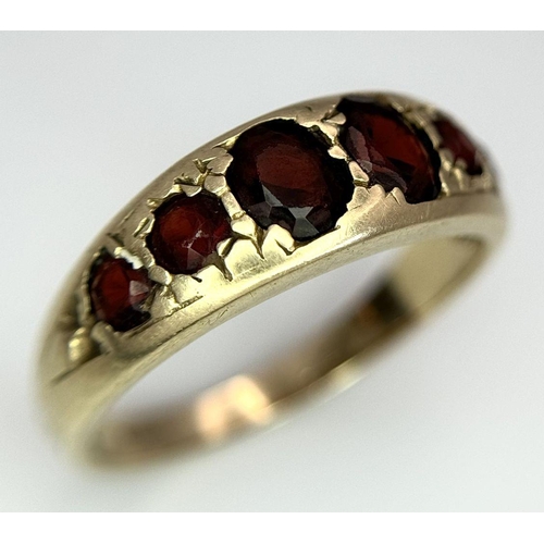 396 - A 9K Yellow Gold Garnet Gypsy Ring, 1.60ct garnet weight, 2.9g total weight, size N 1/2.

Ref: SH169... 