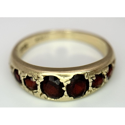 396 - A 9K Yellow Gold Garnet Gypsy Ring, 1.60ct garnet weight, 2.9g total weight, size N 1/2.

Ref: SH169... 