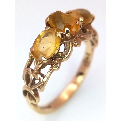 424 - A 9K yellow gold vintage citrine trilogy ring, size N 1/2 (citrine: 1.35ct) 2.6g. Ref: TC04