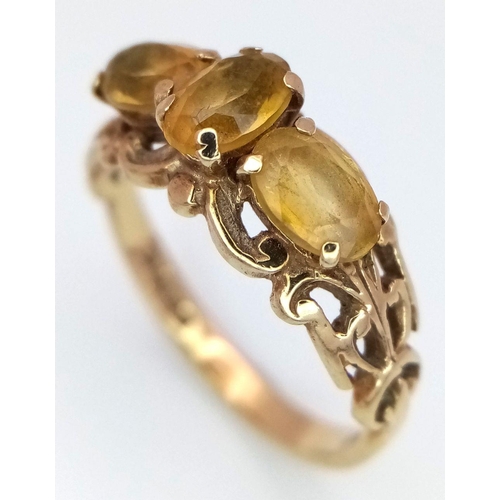 424 - A 9K yellow gold vintage citrine trilogy ring, size N 1/2 (citrine: 1.35ct) 2.6g. Ref: TC04