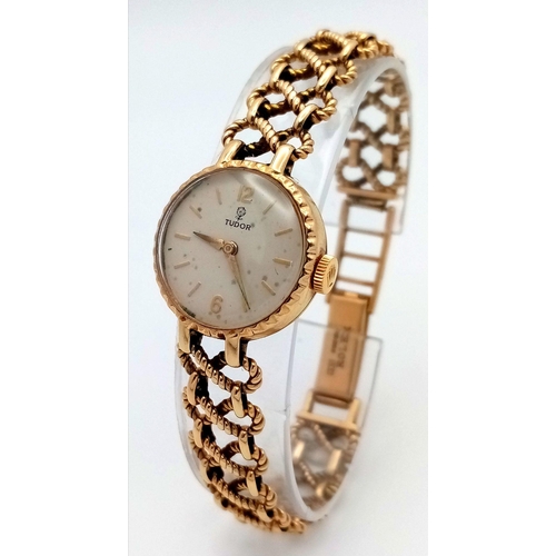 50 - A Beautiful Tudor 9K Gold Ladies Watch. 9K gold bracelet and case. Bracelet is marked ROLEX. White d... 