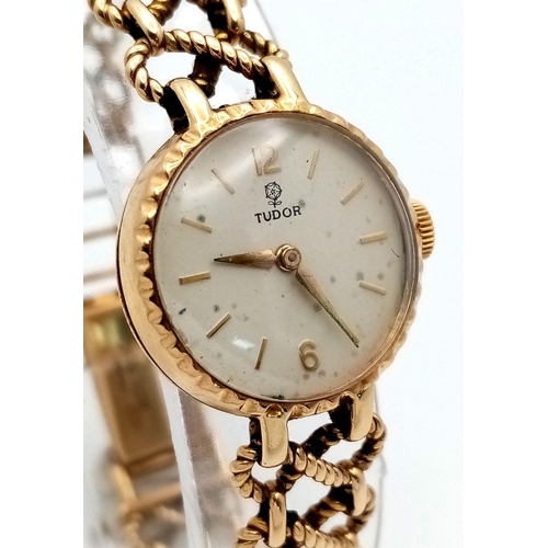 50 - A Beautiful Tudor 9K Gold Ladies Watch. 9K gold bracelet and case. Bracelet is marked ROLEX. White d... 