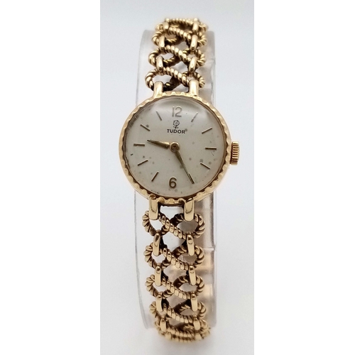 50 - A Beautiful Tudor 9K Gold Ladies Watch. 9K gold bracelet and case. Bracelet is marked ROLEX. White d... 