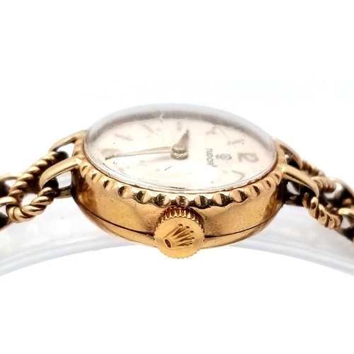 50 - A Beautiful Tudor 9K Gold Ladies Watch. 9K gold bracelet and case. Bracelet is marked ROLEX. White d... 