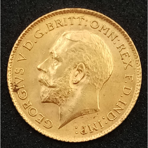 604 - A 1914 George V 22K Gold Half Sovereign.