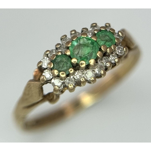 614 - A 9K yellow gold diamond and emerald ring, size J 1/2. (dia:0.10ct/emerald 0.20ct) 1.5g. Ref: TC03