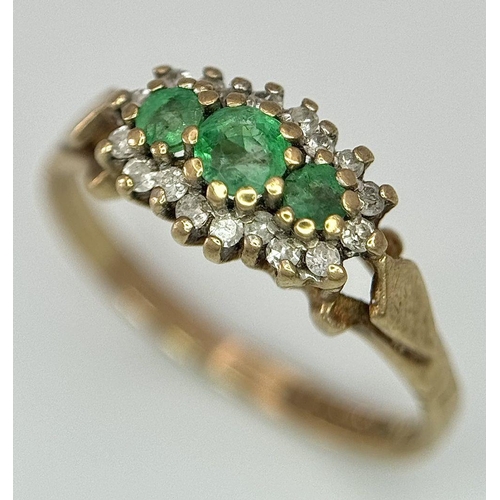 614 - A 9K yellow gold diamond and emerald ring, size J 1/2. (dia:0.10ct/emerald 0.20ct) 1.5g. Ref: TC03