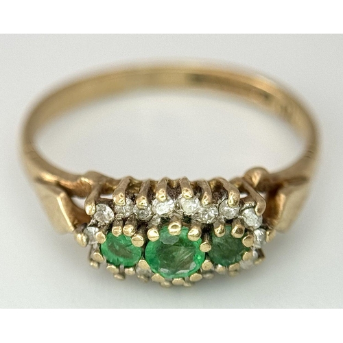 614 - A 9K yellow gold diamond and emerald ring, size J 1/2. (dia:0.10ct/emerald 0.20ct) 1.5g. Ref: TC03