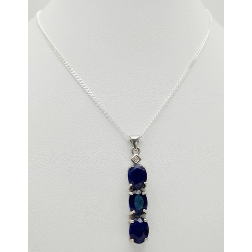 648 - A Sterling Silver Three Blue Sapphire and Diamond Set Pendant Necklace. 46cm Length. The Pendant Mea... 